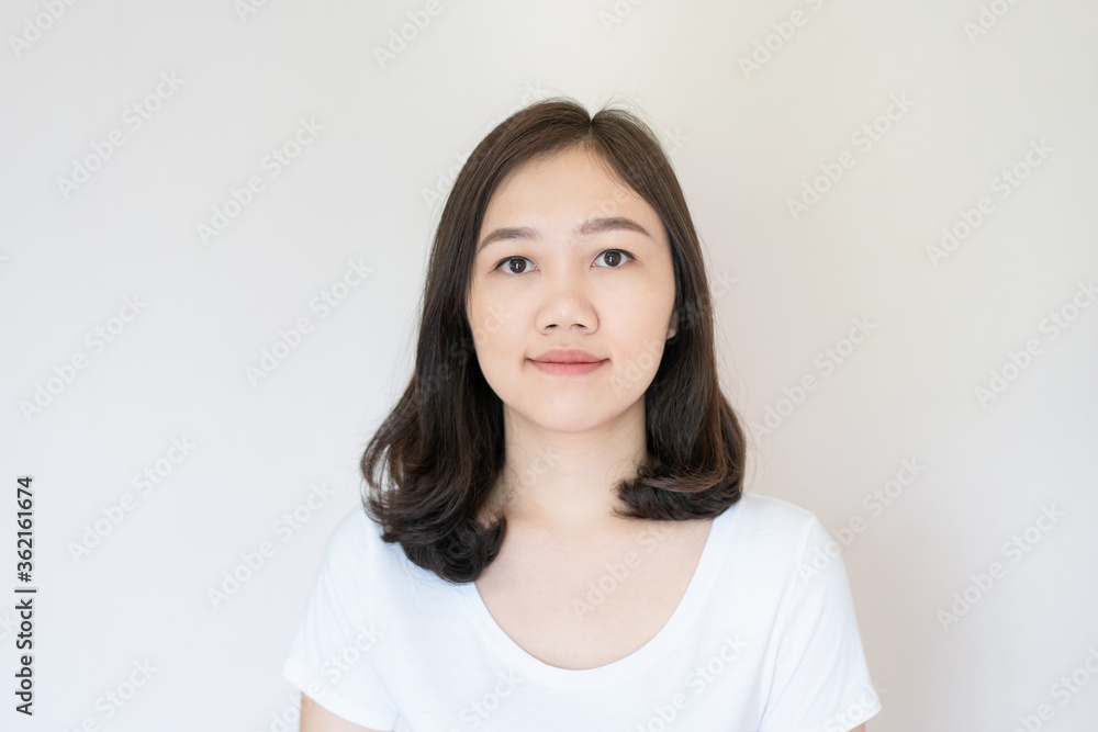 Premium Photo  Portrait of a beautiful young asian woman in white