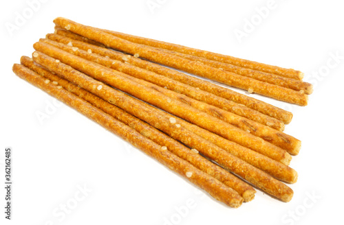 Salty snacks. Long stick pretzels isolated on white background