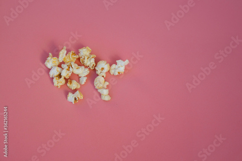 The popcorn on pink background.