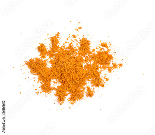 Turmeric powder isolated on white background, indian spice,healthy seasoning ingredient for vegan cuisine concept.