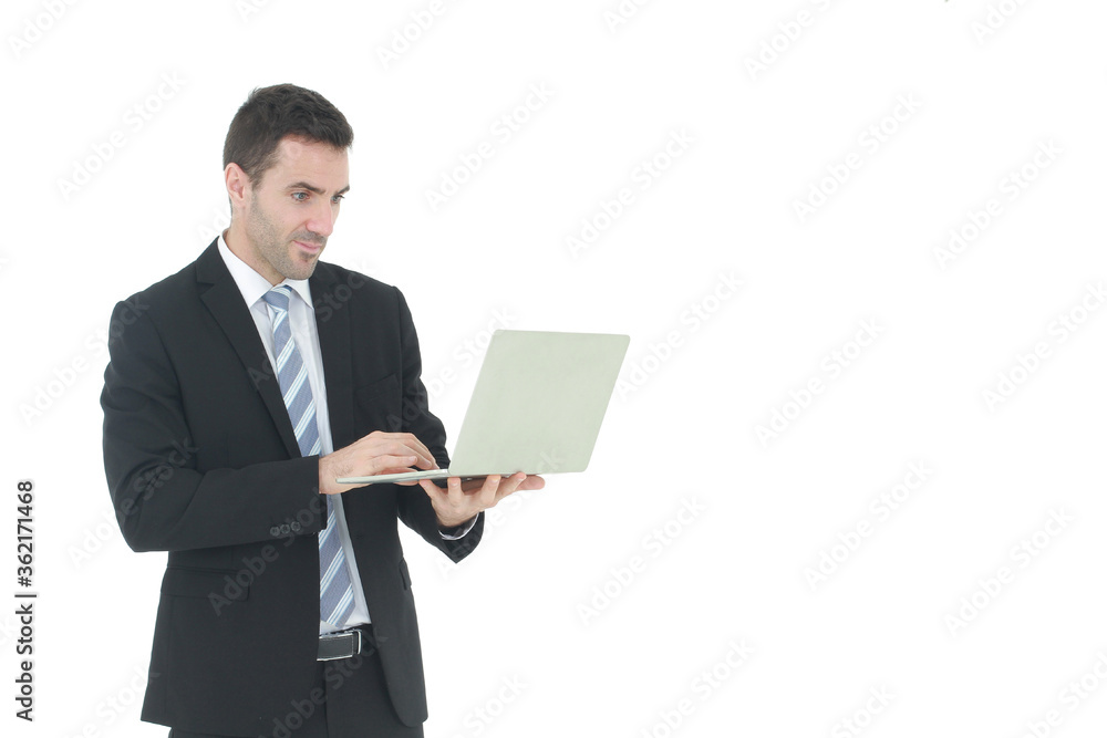 Successful and handsome businessman in a suit smiling with hand holding notebook. He serious in working on a laptop isolated on white background. Copy space Successful and handsome businessman in a suit smiling with hand holding notebook. He serious in working on a laptop isolated on white background. Copy space