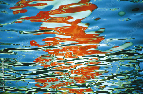 water reflection of a lighthouse