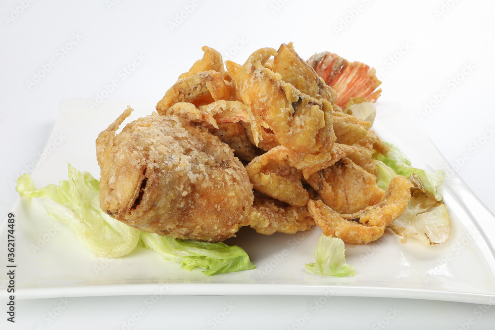 Deep fried freshwater red whole tilapia fish sliced fillet Deep fried freshwater red whole tilapia fish sliced fillet