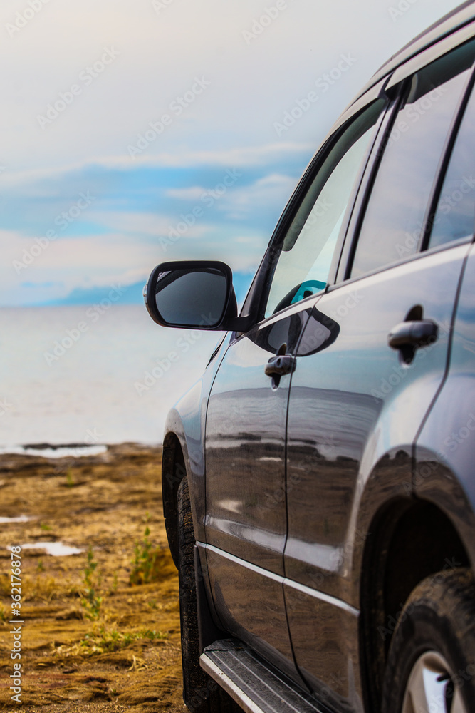 Fototapeta premium SUV near the sea