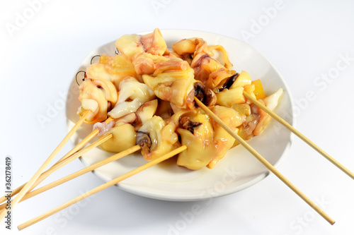 Cuttlefish on a plate separated from the white background