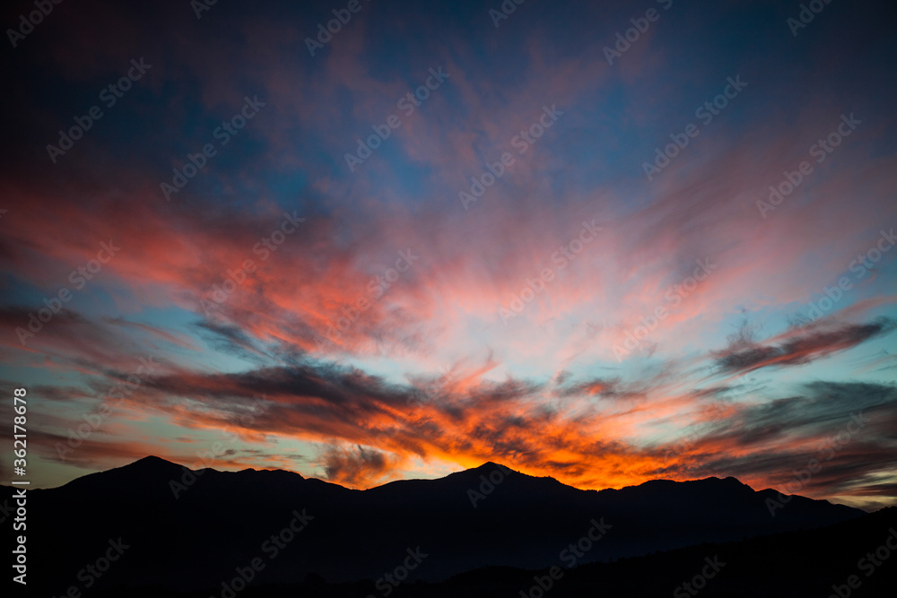 Sunset in Himalaya mountains. Mountain peaks. Bright colorful sky. Mountains landscape. Highlands nature. Backgrounds. Nepal. Kathmandu.