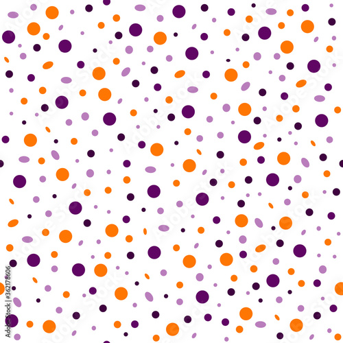 Seamless abstract pattern of circles of different sizes in a chaotic manner in the colors of Halloween on a white background. Design of products on the theme of Halloween textiles, packaging, bags