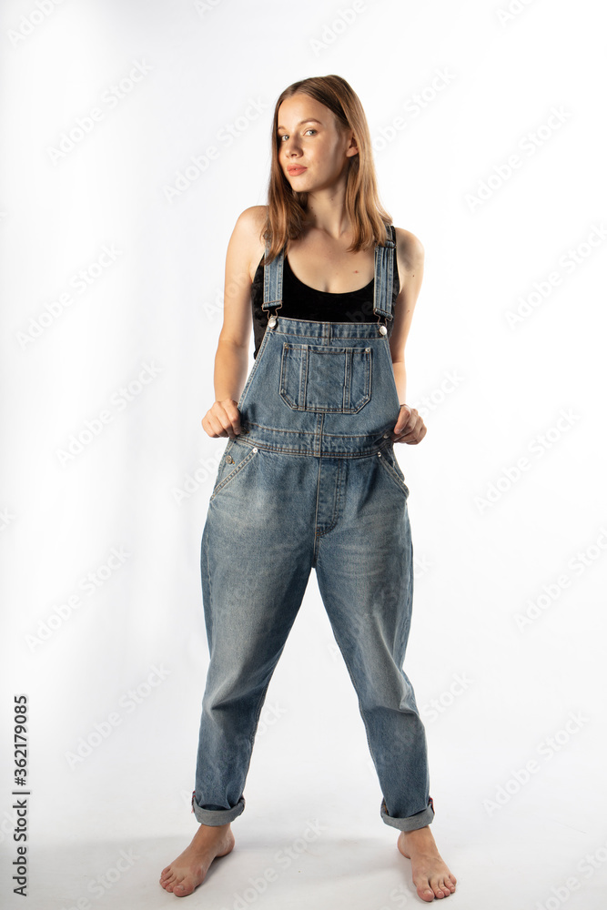 young girl in denim overalls, studio shooting
young girl in denim overalls, studio shooting