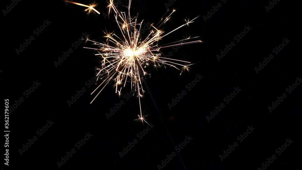 Sparkler in the dark at Christmas Sparkler in the dark at Christmas