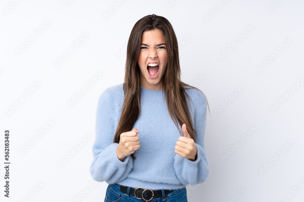 Teenager girl over isolated white background frustrated by a bad situation Teenager girl over isolated white background frustrated by a bad situation