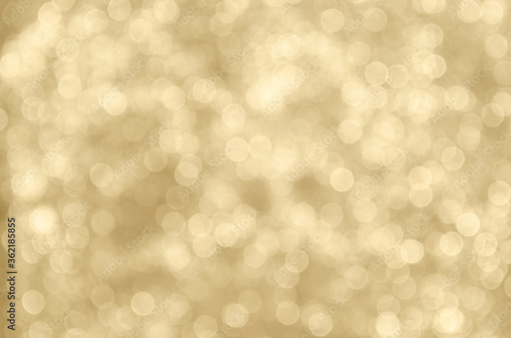 Champagne colored bokeh background. Champagne colored bokeh background.