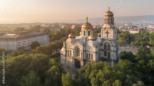 Aerial view of the Cathedral of the Assumption on sunrise, Varna Bulgaria. Byzantine style church with golden domes. Varna is the sea capital of Bulgaria.