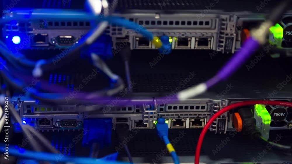 Back Side Of Modern Working Data Center Servers With Cables - Cloud Service And E-Commerce, Upload And Download Server With Cables And Flashing LED Lights - Tilt Up Back Side Of Modern Working Data Center Servers With Cables - Cloud Service And E-Commerce, Upload And Download Server With Cables And Flashing LED Lights - Tilt Up
