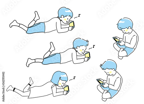 寝ながらゲームする子ども達