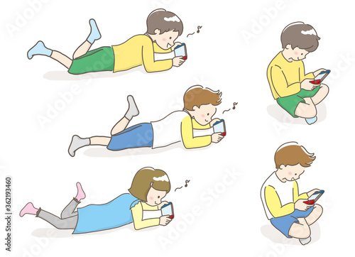 寝ながらゲームする子ども達