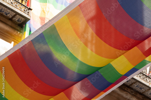 Rainbow flag on the balcony of a house in the Chueca district of Madrid photo