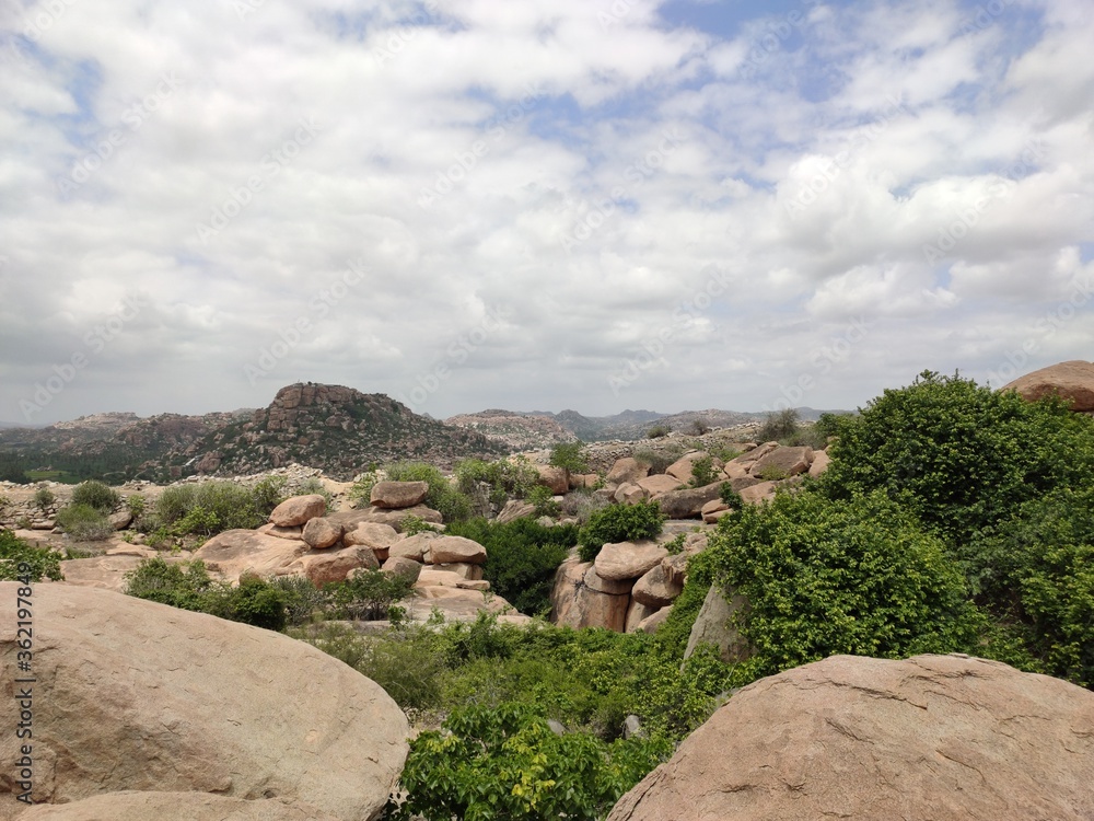 Hindu temples , caves and hills located in hampi