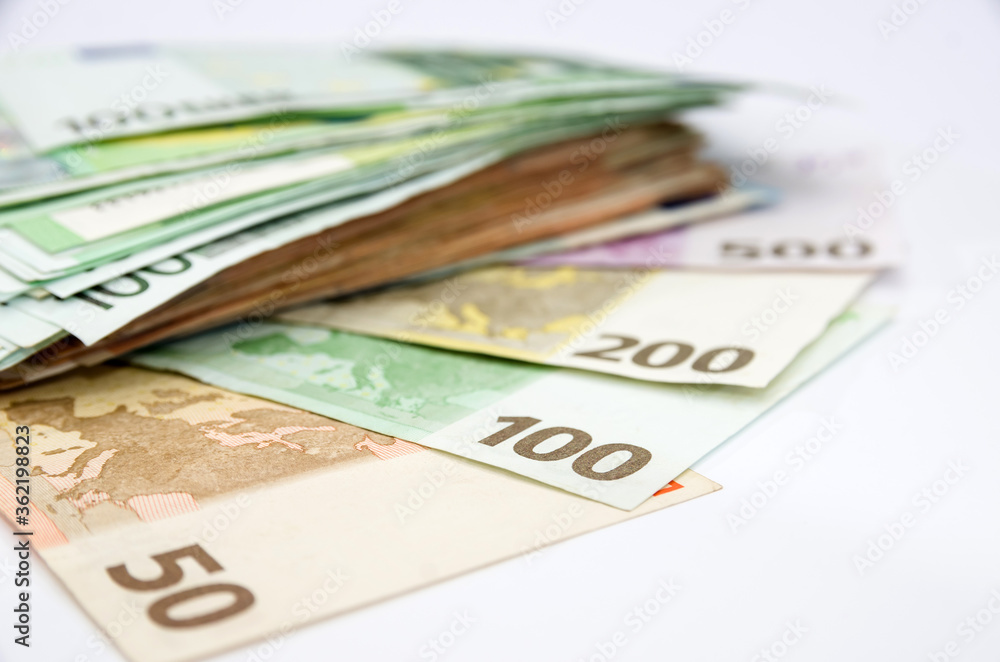 different euro banknotes on white. Close-up. Financial concept. different euro banknotes on white. Close-up. Financial concept.