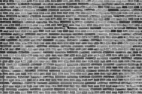 Black and white brick wall texture background. Grey bricks texture