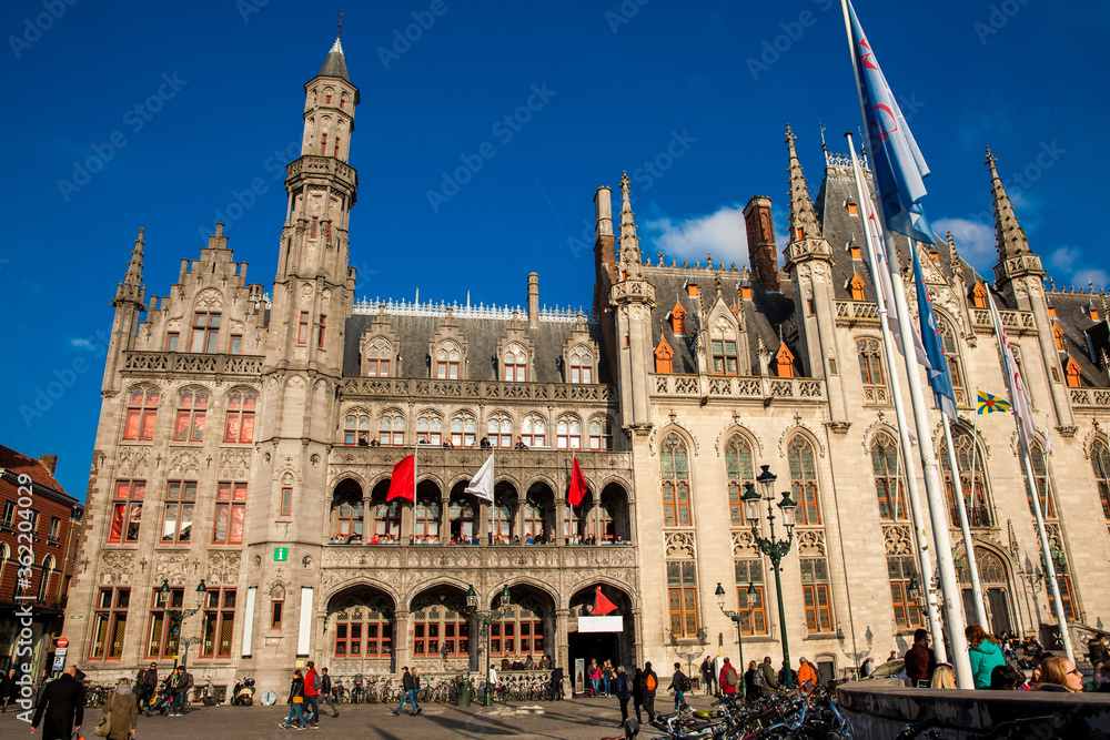 Fototapeta premium Provincial Court and Historium Bruges buildings on the market place