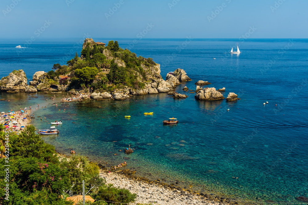 A view of the coastline and Isola Bella, Taormina, Sicily in summer