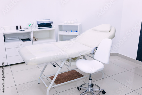 Fototapeta Naklejka Na Ścianę i Meble -  Modern medical examination couch in doctor's office