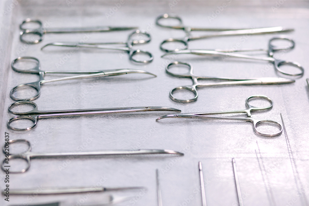 set of surgical tools on table set of surgical tools on table