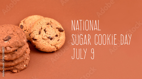 National Sugar Cookie Day images. Cookies on a brown background stock images. sweet chocolate and sugar cookies images. American sweet biscuits photo. Sugar Cookie Day Poster, July 9