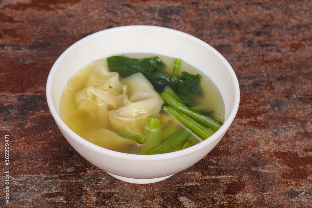Asian traditional Wonton soup with herbs Asian traditional Wonton soup with herbs