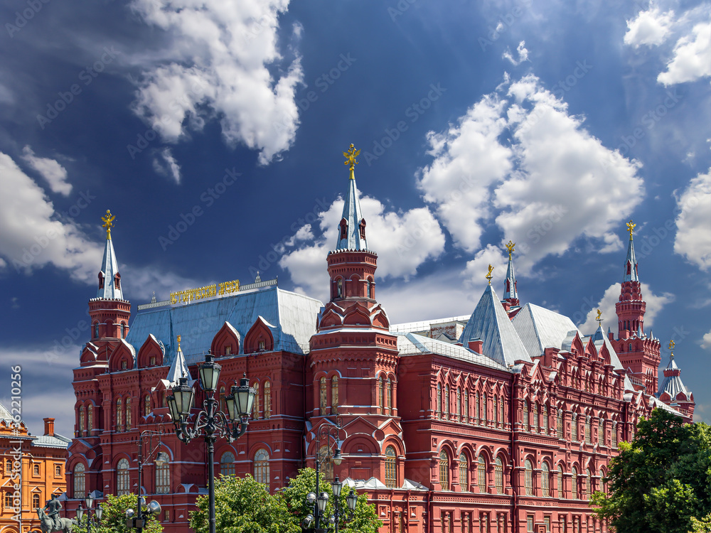Historical Museum on a cloud background. Red Square, Moscow, Russia. Historical Museum-- inscription in russian