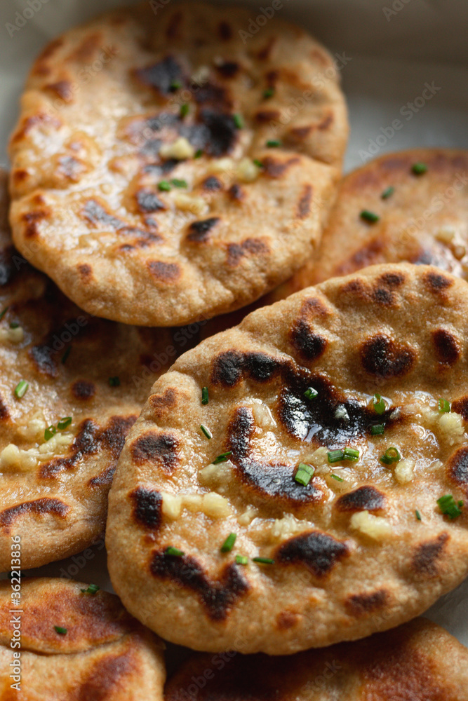 Homemade Indian Naan Flatbread made with Whole Wheat Homemade Indian Naan Flatbread made with Whole Wheat