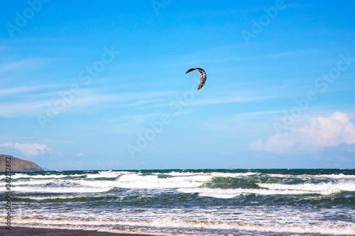 Sail from kitesurfing over the big waves of the South China Sea in Mui Ne, Vietnam