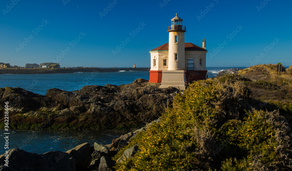 Bandon Lighthouse on the Oregon coast and Coquille River near Bandon.