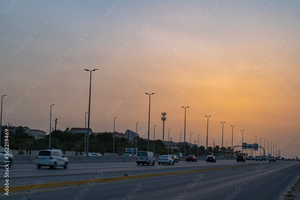 Highway traffic at sunset in eastern province of Saudi Arabia