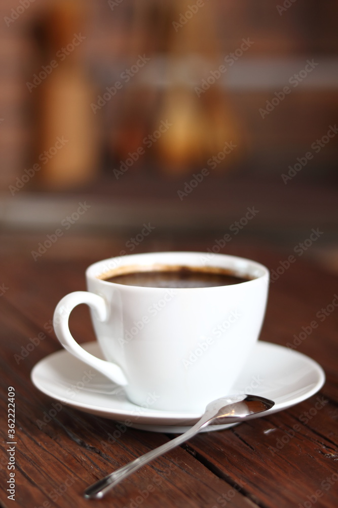Coffee Cup on wooden plank table Coffee Cup on wooden plank table