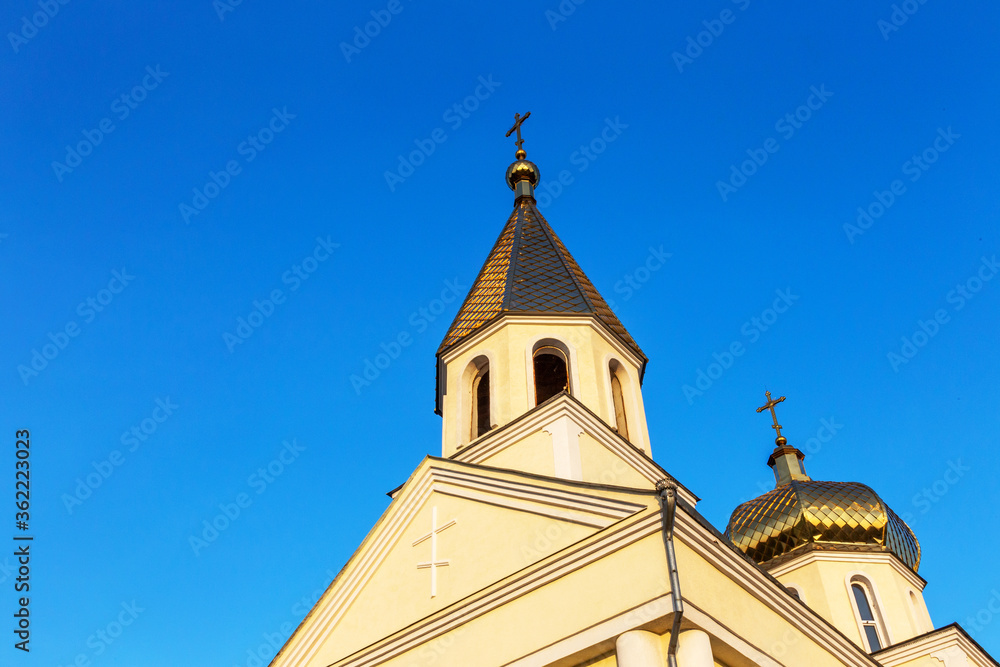 Golden dome with a cross of the Orthodox Cathedral