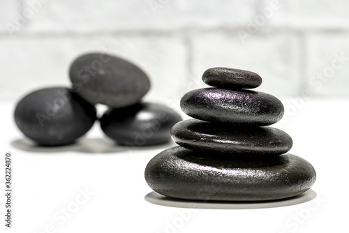 Black lava stones for relaxation stacked