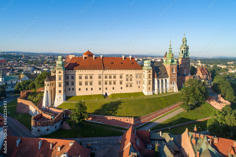 Krakow, Poland. Skyline with historic royal Wawel cathedral and castle. Aerial view in sunrise light early in the morning in summer
