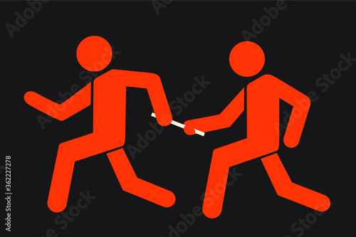 runner passing the baton to teammate 