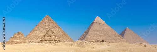 The pyramids at Giza in Egypt. Web banner in panoramic view.