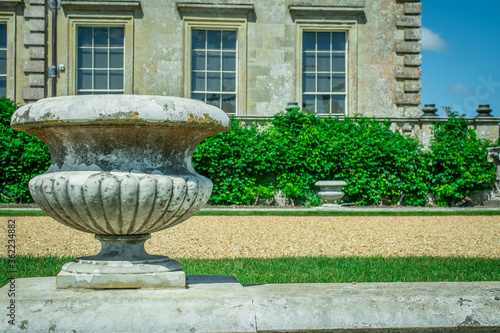 urns  in front of a palace photo