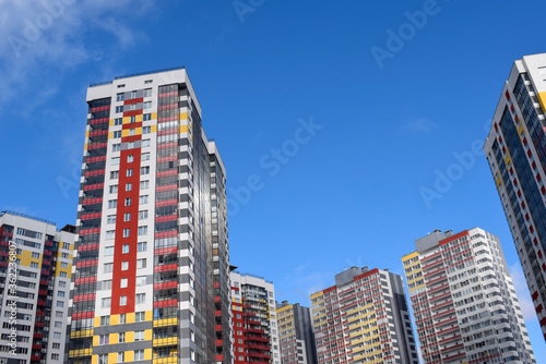 Beautiful new houses, high-rise buildings against the sky