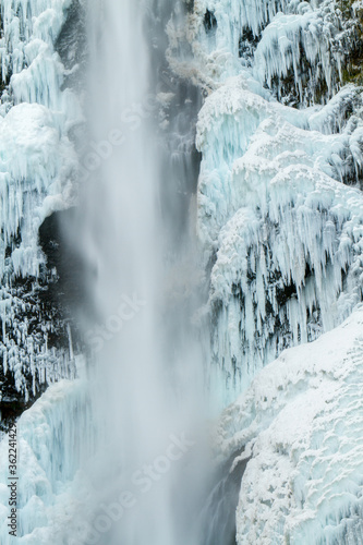 Multnomah Falls  after a winter snow and ice storm  The falls is in the Columbia River Gorge National Scenic Area, about 18 miles east of Portland, Oregon.