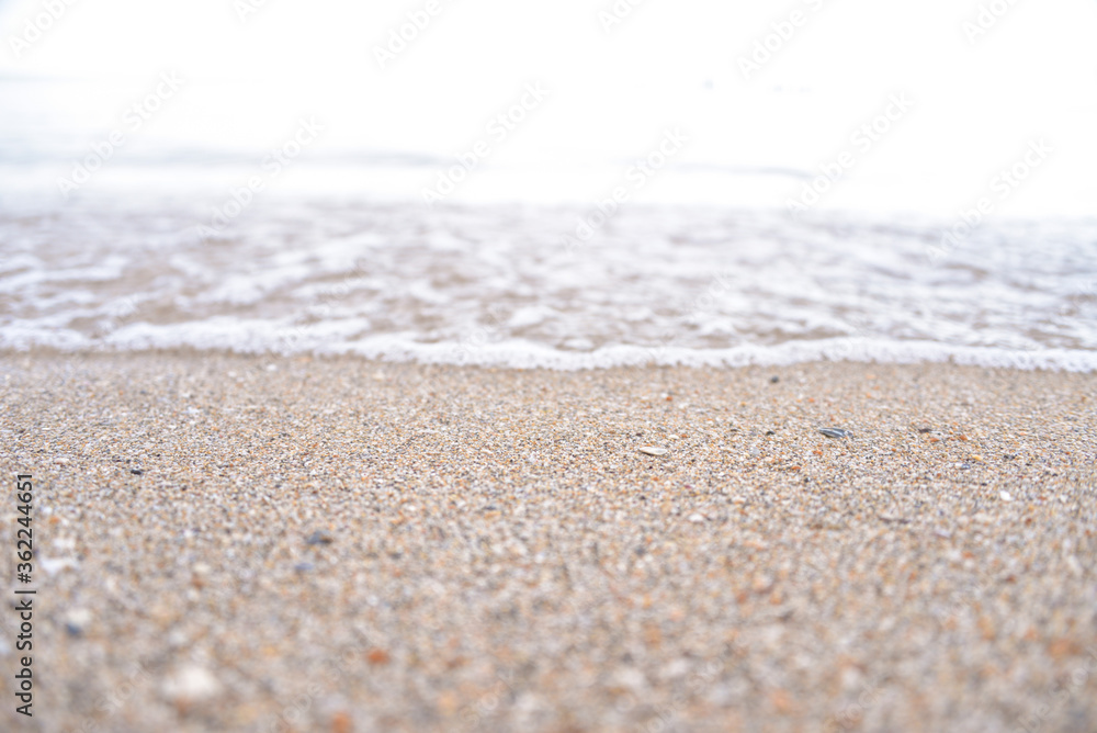 calm sea, small waves, clear and transparent water, small sand near the shore calm sea, small waves, clear and transparent water, small sand near the shore