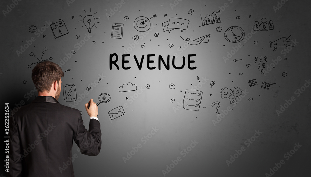 businessman drawing a creative idea sketch with REVENUE inscription, business strategy concept businessman drawing a creative idea sketch with REVENUE inscription, business strategy concept
