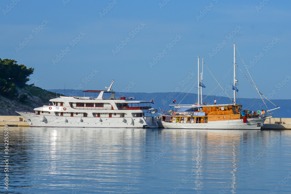 MAKARSKA, CROATIA - JUNE 17: Docked ships in marina in Makarska, Croatia on June 17, 2019.
