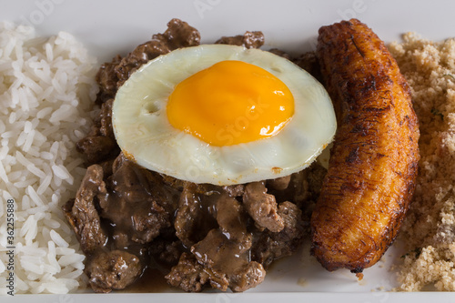 typical Brazilian dish  diced meat  rice  fried egg and fried banana