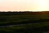 Dune landscape in St. Peter Ording with the setting sun