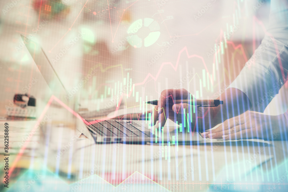 Double exposure of woman hands typing on computer and forex chart hologram drawing. Stock market invest concept. Double exposure of woman hands typing on computer and forex chart hologram drawing. Stock market invest concept.
