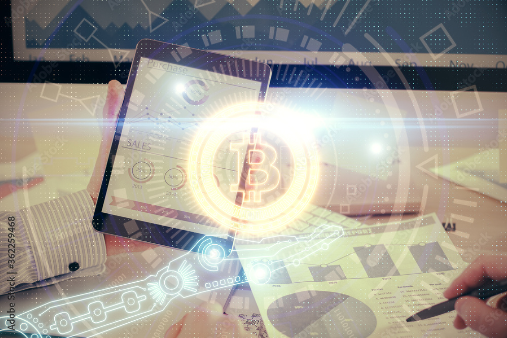 Double exposure of man's hands holding and using a phone and crypto currency blockchain theme drawing.